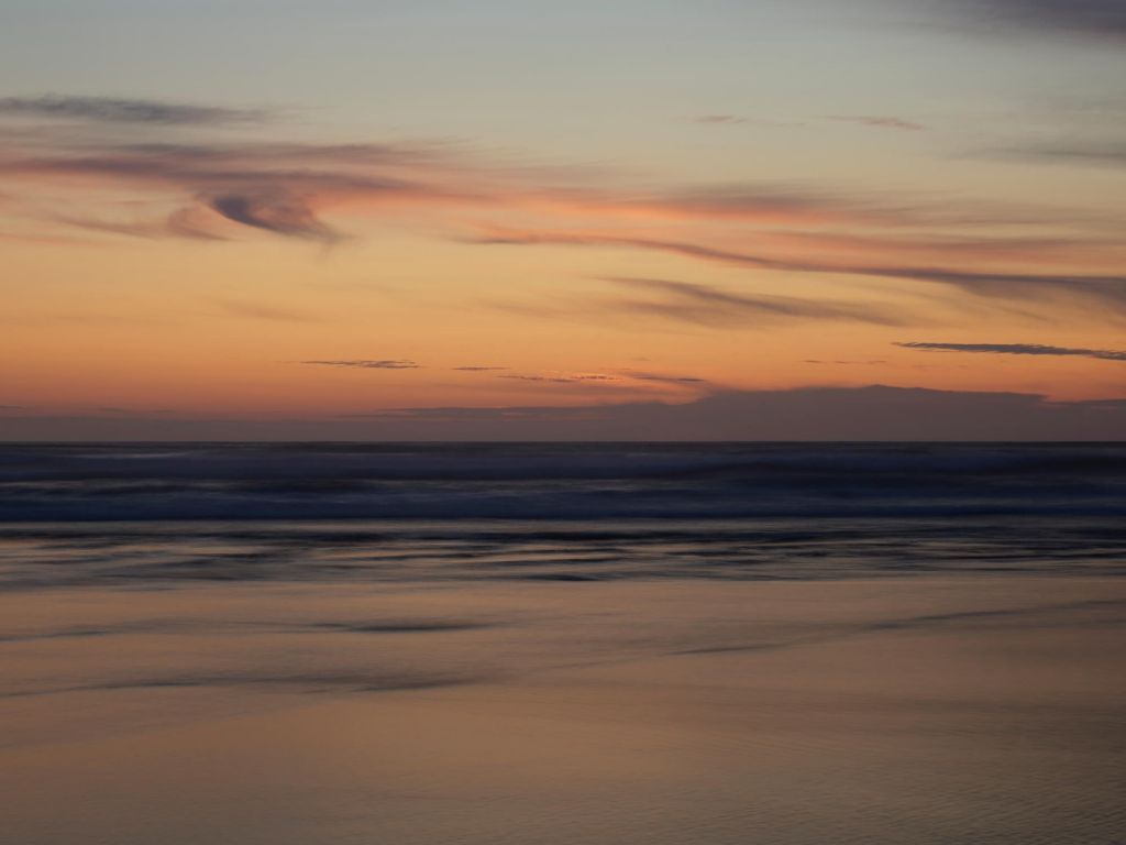 Zonsondergang aan de kust