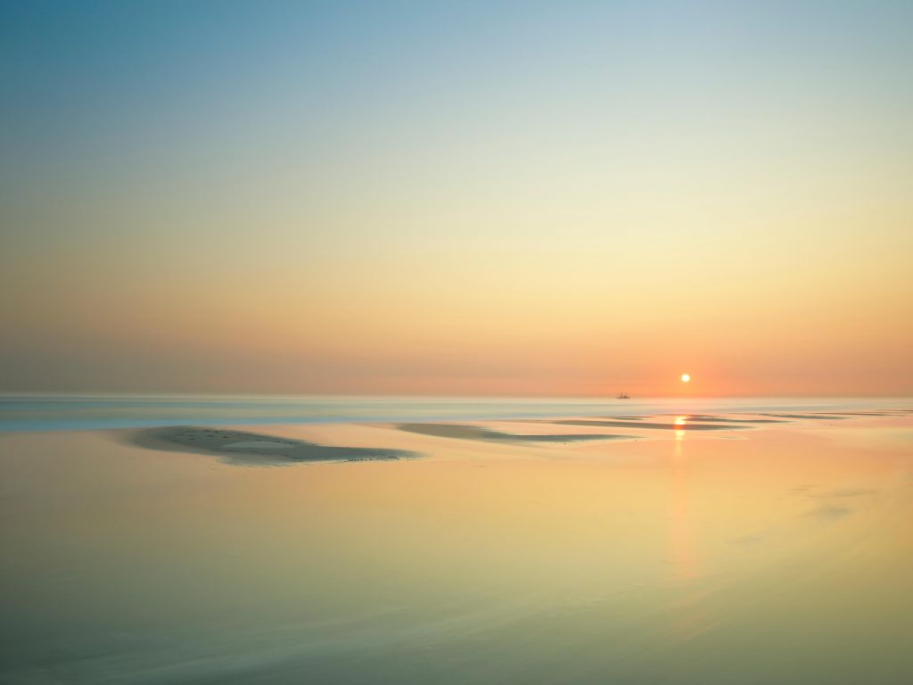 Zonsondergang aan het strand