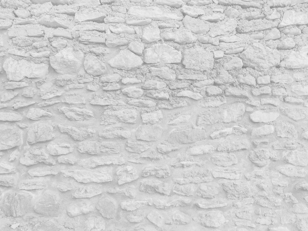 Lichte muur met grove stenen
