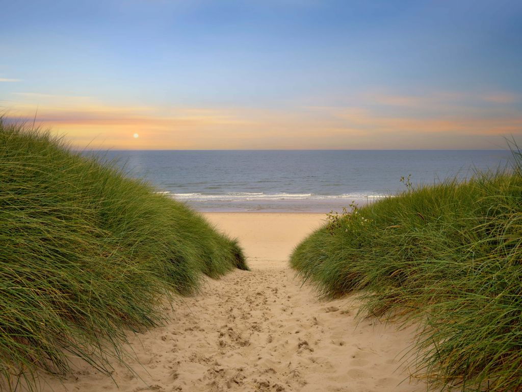 Zonsondergang bij strand