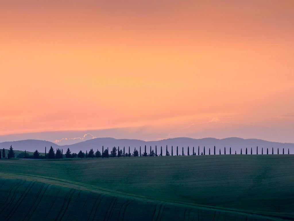 Italiaans landschap met oranje lucht