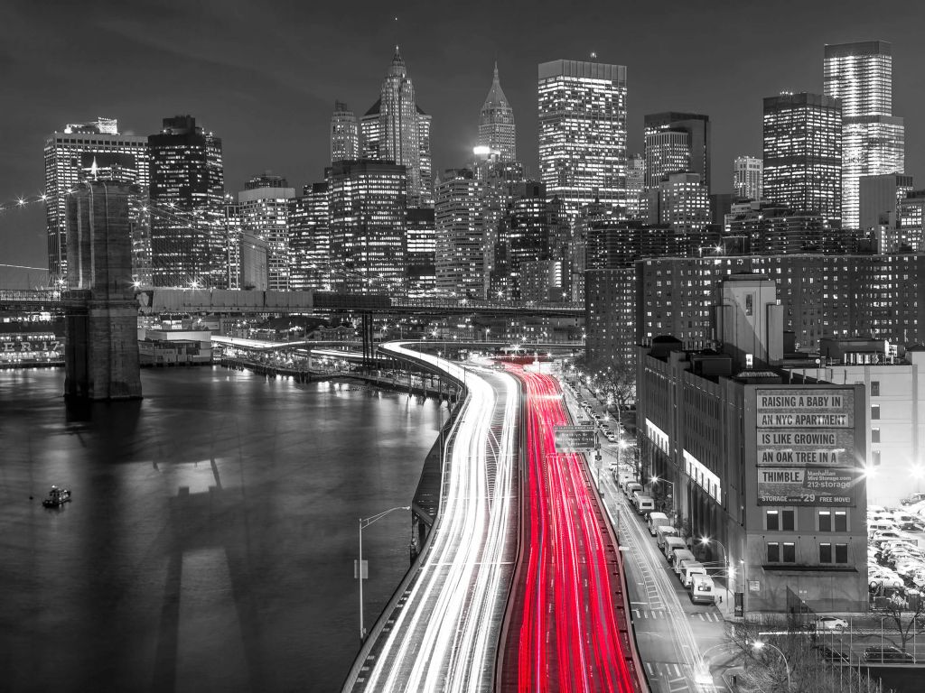 Strip lights on streets of Manhattan by east river, New York