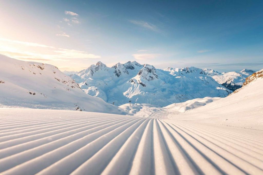 Ochtendgloren op verse pistes
