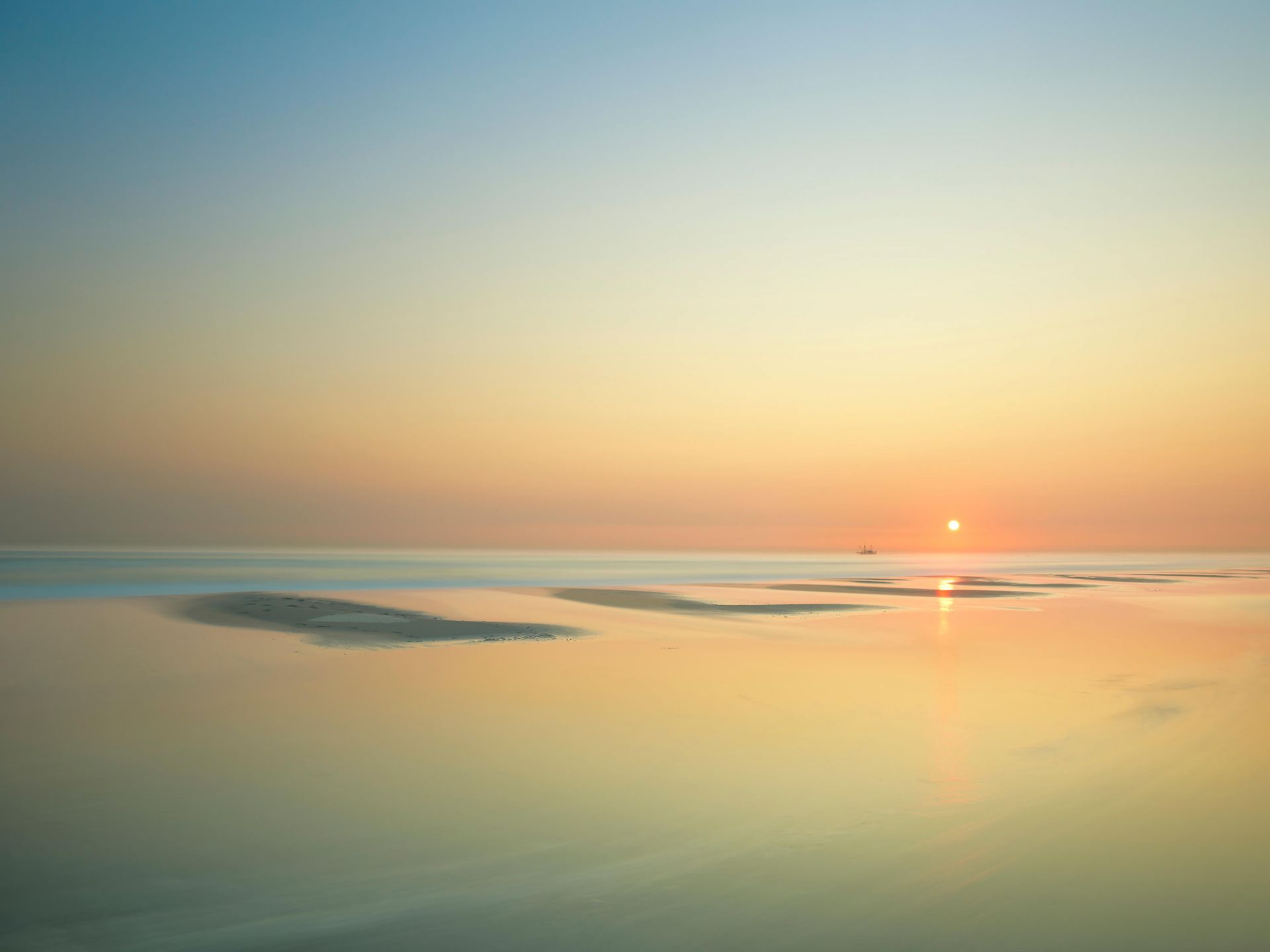 Zonsondergang aan het strand